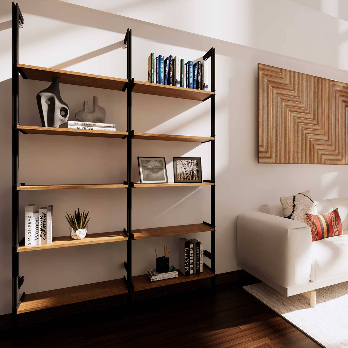 Wood shelf modular shelving unit with Casting Light shelves and black vertical posts, one bay, styled in a modern room.