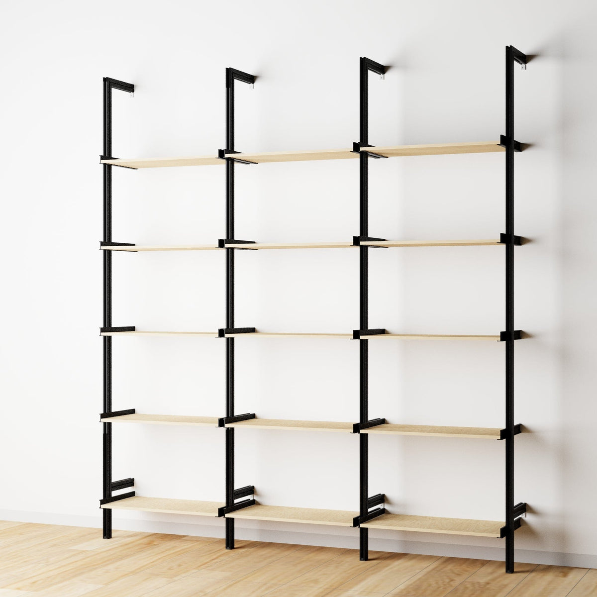 Wood shelf modular shelving unit with Casting Light shelves and black vertical posts, three bays, 24-inch shelf width, shown with open shelf levels.