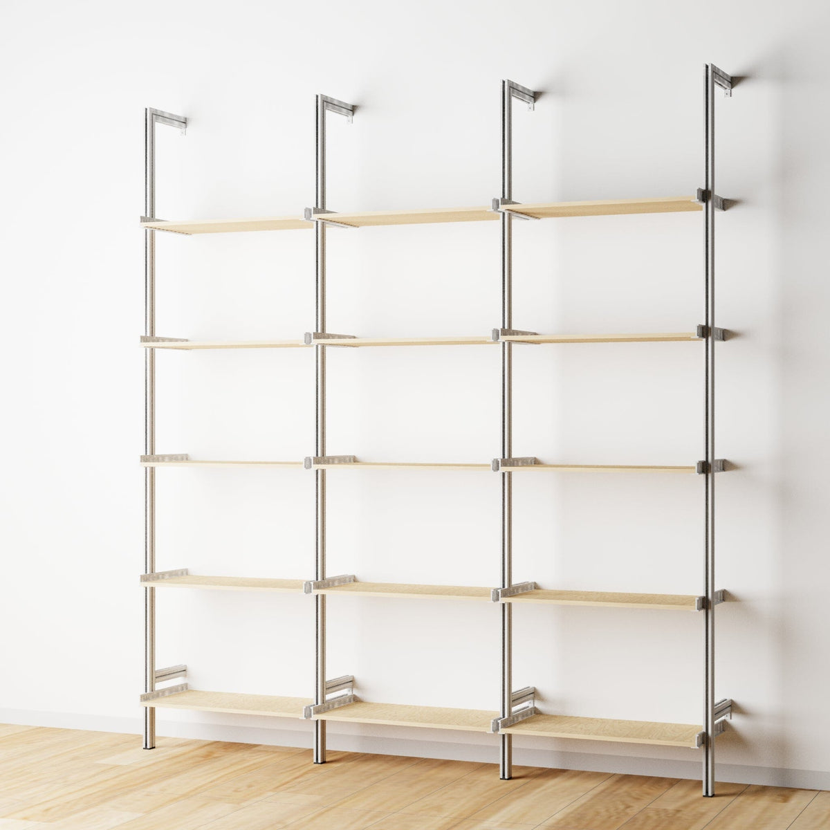 Wood shelf modular shelving unit with Casting Light shelves and satin vertical posts, three bays, 24-inch shelf width, shown with open shelf levels.
