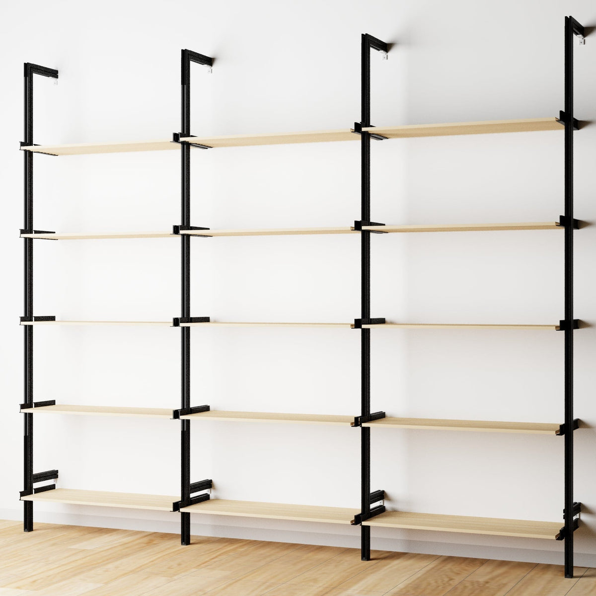 Wood shelf modular shelving unit with Casting Light shelves and black vertical posts, three bays, shown with open shelf levels.