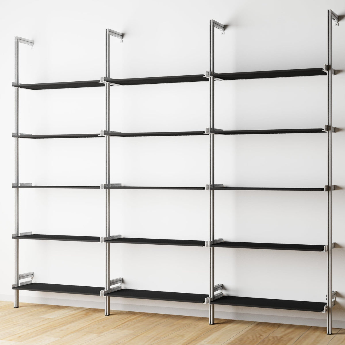 Wood shelf modular shelving extension with black shelves and satin vertical post, three bays, shown with open shelf levels.