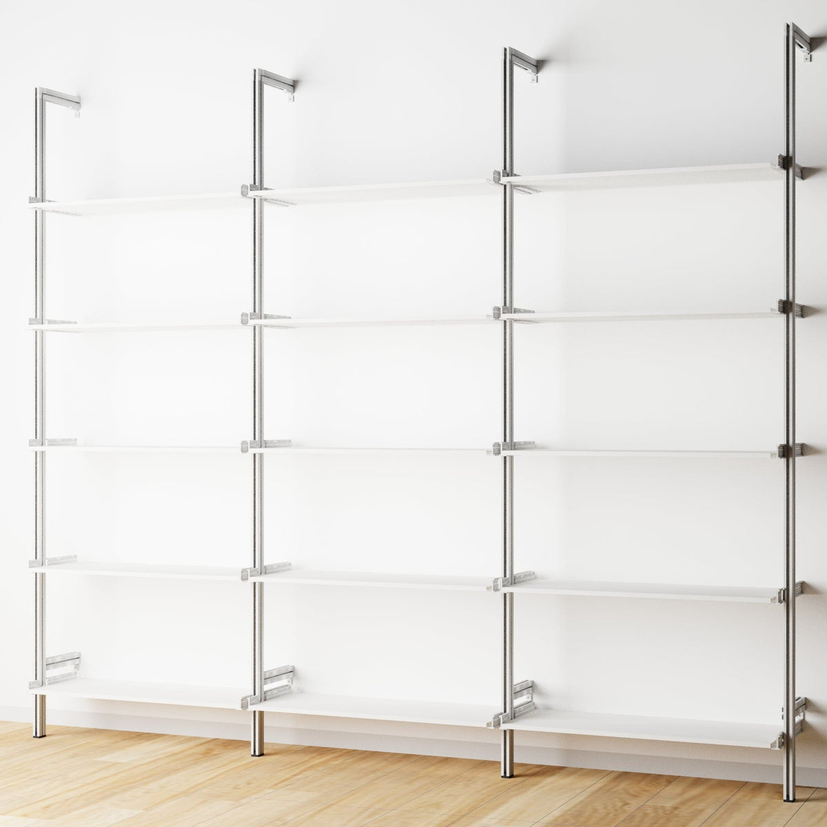 Wood shelf modular shelving extension with white shelves and satin vertical post, three bays, shown with open shelf levels.