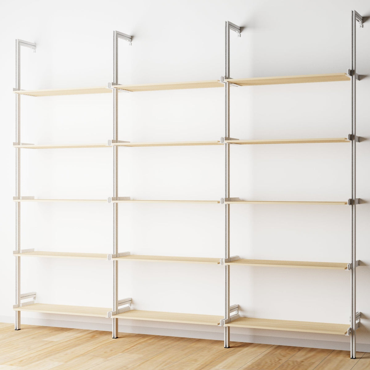 Wood shelf modular shelving extension with Casting Light shelves and white vertical post, three bays, shown with open shelf levels.