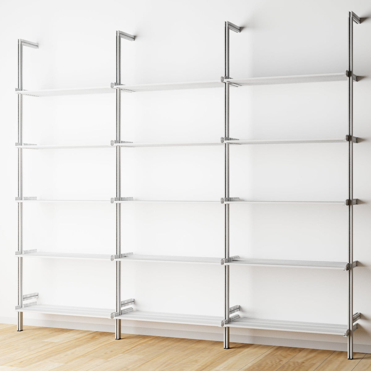 Modular shelving unit with satin shelves and satin vertical posts, three bays, 24-inch shelf width, shown with open shelf levels.