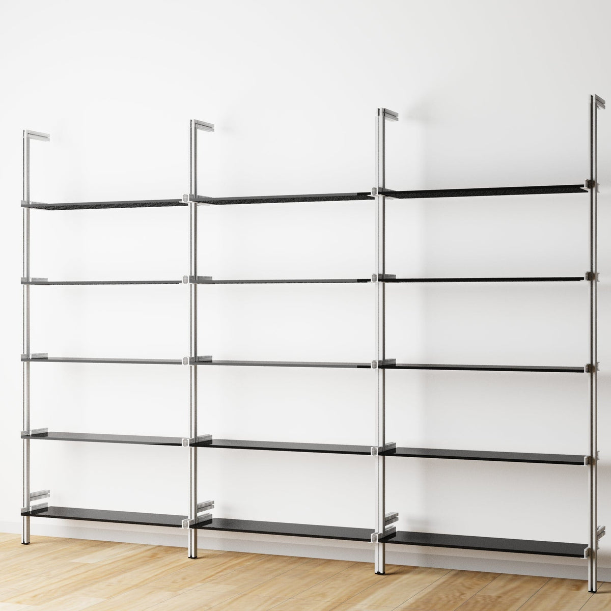 Modular shelving unit with black shelves and satin vertical posts, three bays, 31-inch shelf width, shown with open shelf levels.