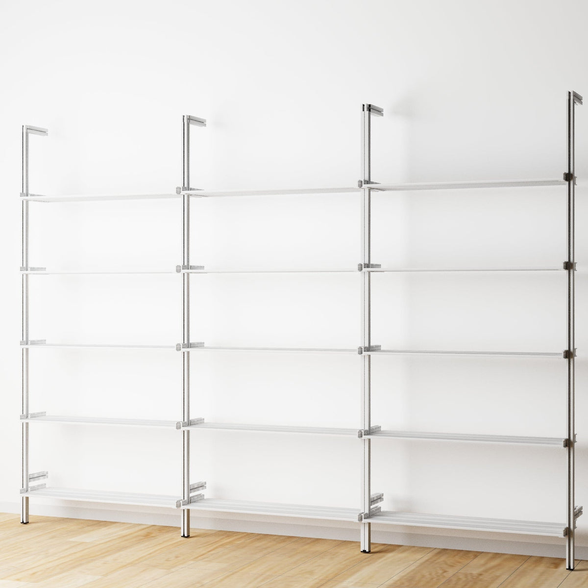 Modular shelving unit with satin shelves and satin vertical posts, three bays, 31-inch shelf width, shown with open shelf levels.