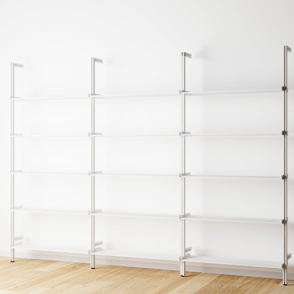 Modular shelving unit with white shelves and white vertical posts, three bays, 31-inch shelf width, shown with open shelf levels.