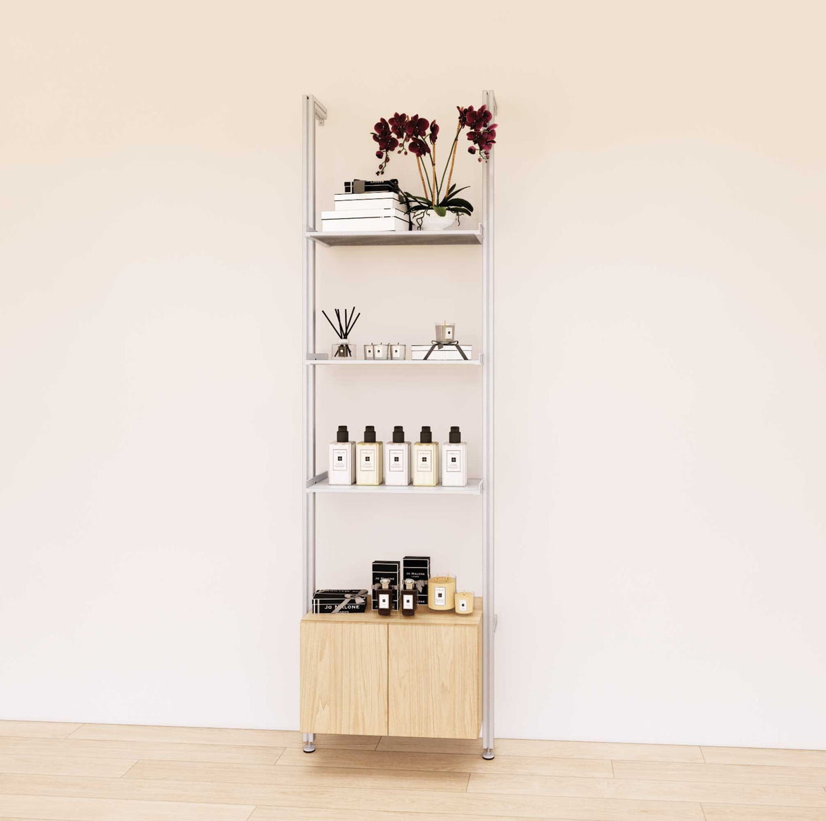 Retail display shelving unit with Casting Light shelves, satin vertical posts, and base cabinets in a 24-inch, one-bay configuration, shown with open display shelving.