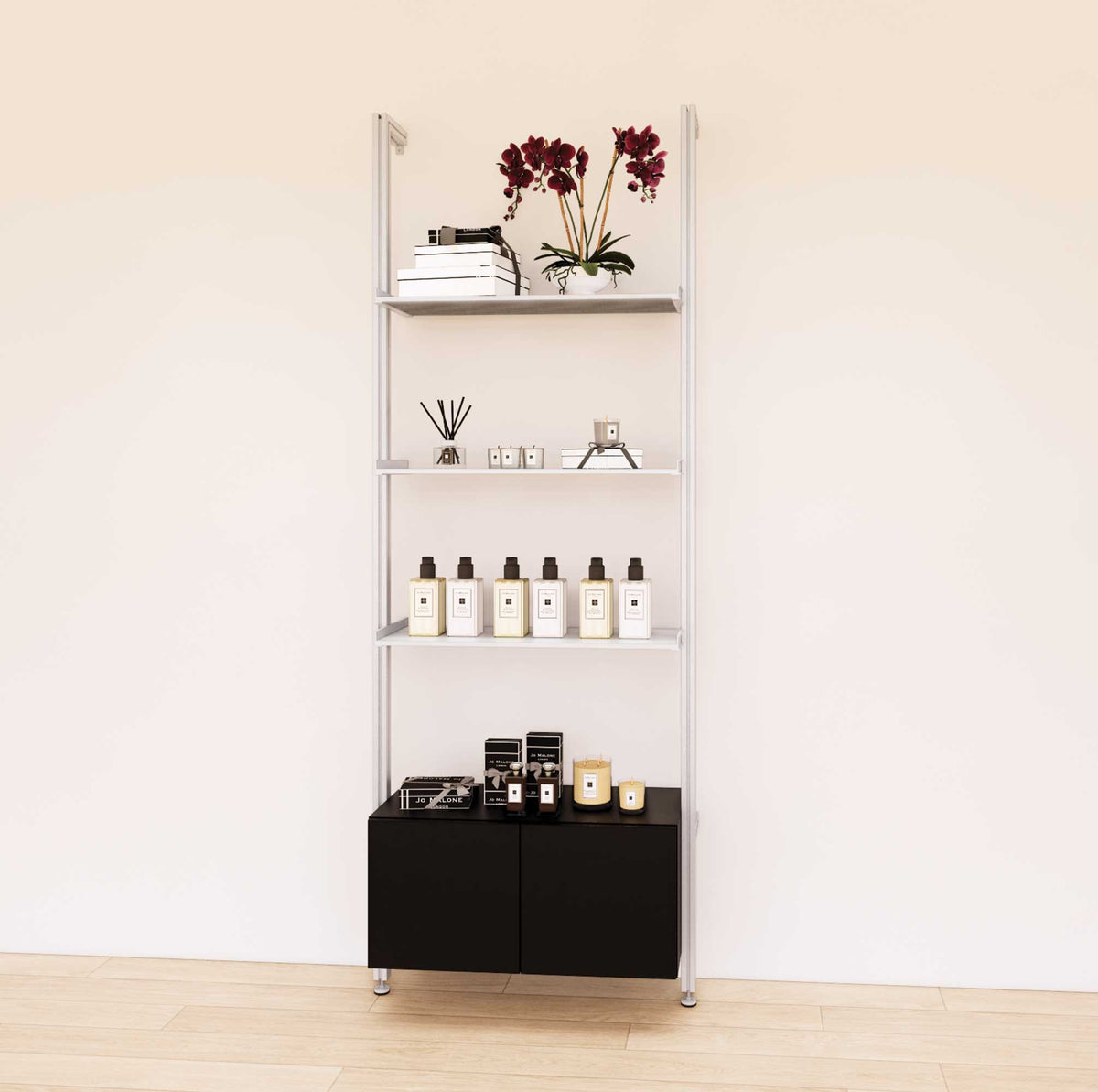 Retail display shelving unit with black shelves, satin vertical posts, and base cabinets in a 31-inch, one-bay configuration, shown with open display shelving.