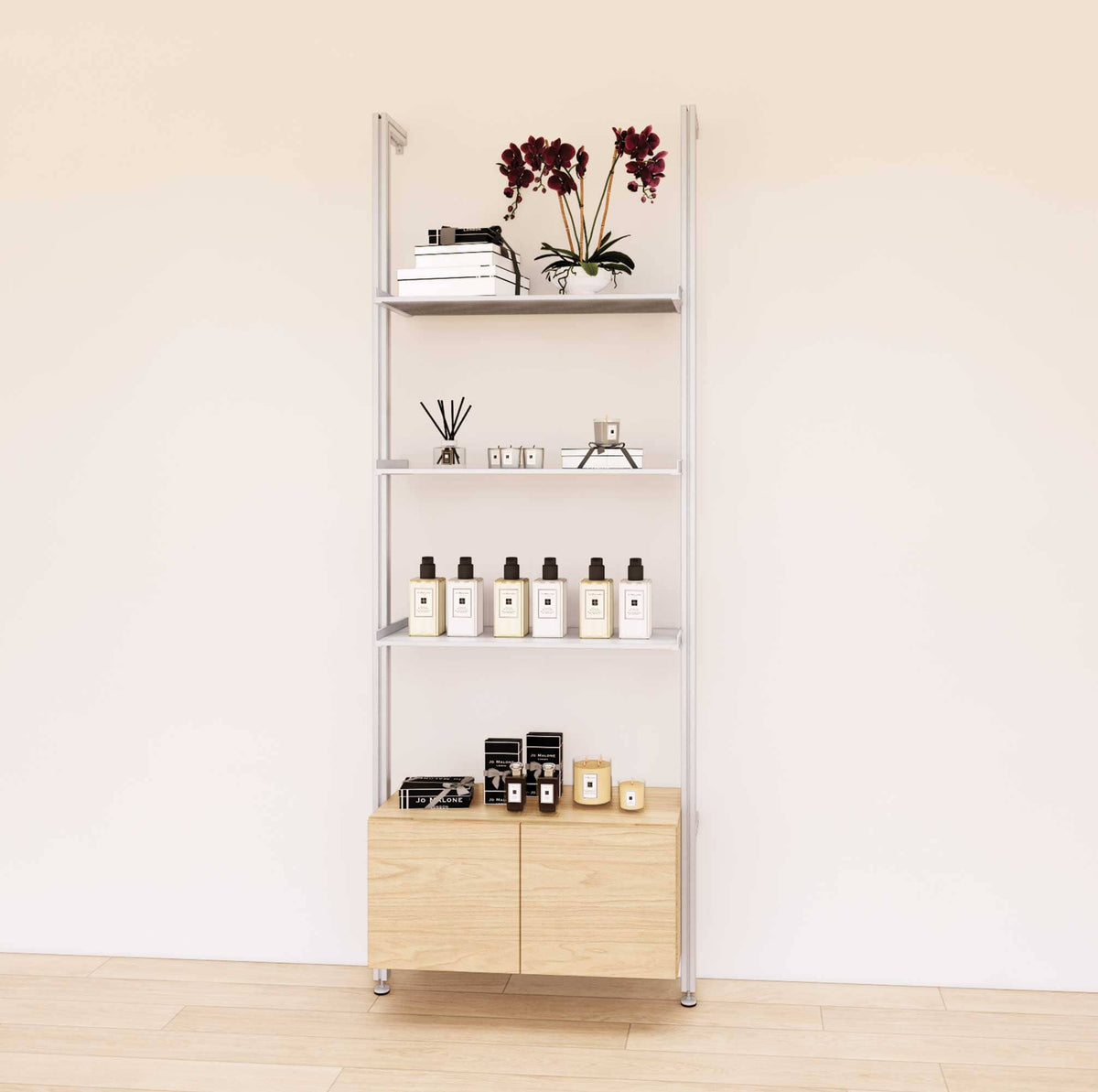 Retail display shelving unit with Casting Light shelves, satin vertical posts, and base cabinets in a 31-inch, one-bay configuration, shown with open display shelving.