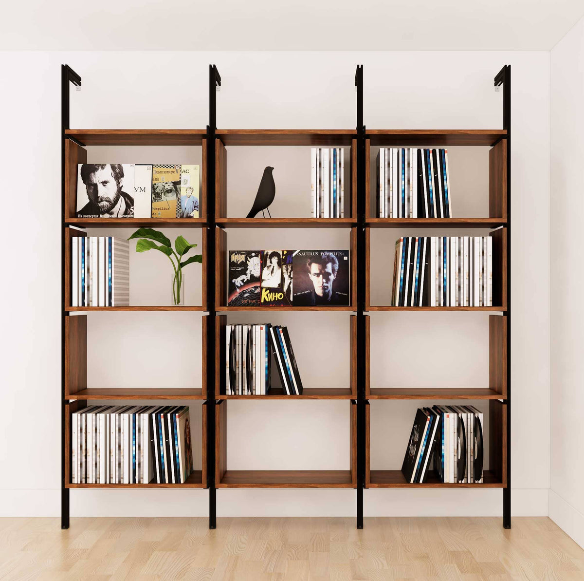 Modular vinyl storage shelving unit with wood-look shelves and black vertical posts, one bay, shown with open record storage shelf levels.