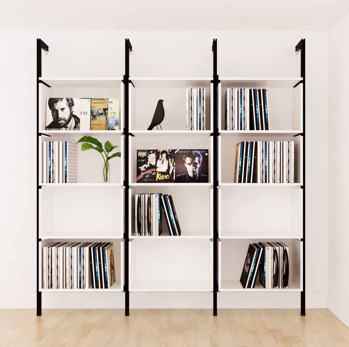 Modular vinyl storage shelving unit with white shelves and black vertical posts, two bays, shown with open record storage shelf levels.