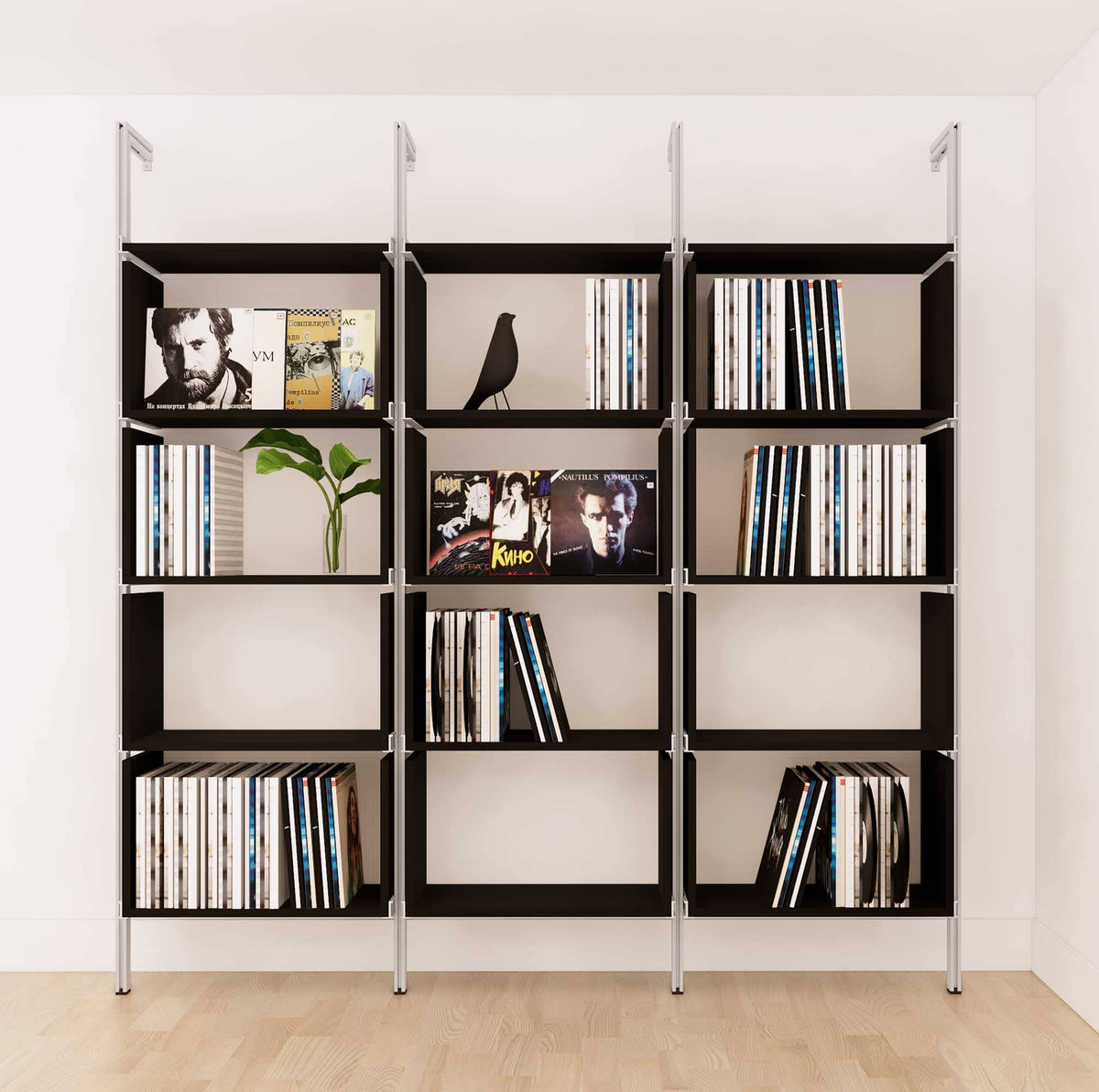 Modular vinyl storage shelving unit with black shelves and satin vertical posts, two bays, shown with open record storage shelf levels.