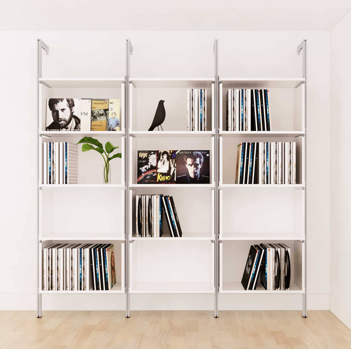 Modular vinyl storage shelving unit with white shelves and satin vertical posts, one bay, shown with open record storage shelf levels.