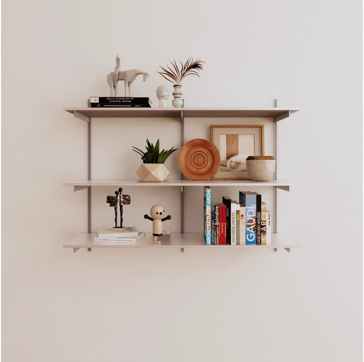 Modular shelving unit with white shelves, satin vertical posts, and one bay, shown with three open shelf levels.