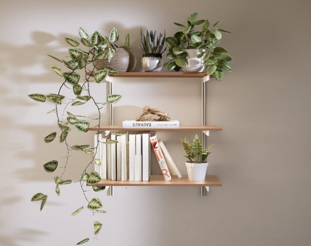 Aluminaire three-shelf modular shelving unit with wood-look aluminum shelves, white vertical posts, one bay, 31-inch width, and three open shelf levels.