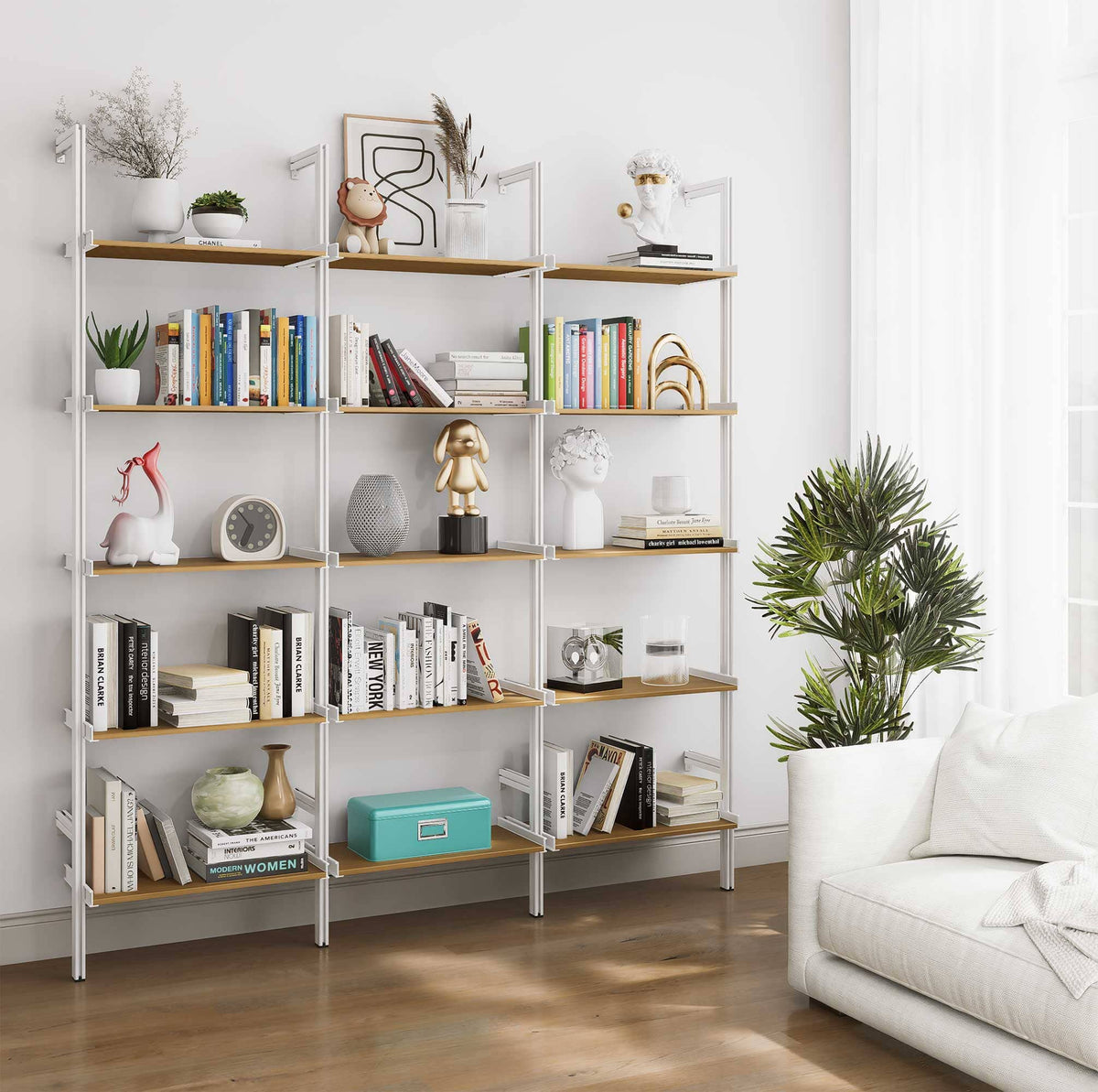 Aluminaire wood inspired modular shelving unit with wood-look aluminum shelves and white vertical posts, three bays, 24-inch shelf width, shown with open shelf levels.