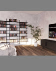 Modular media shelving unit with black shelves, black vertical posts, and media storage bays, shown with eight open shelf levels styled in a room setting.