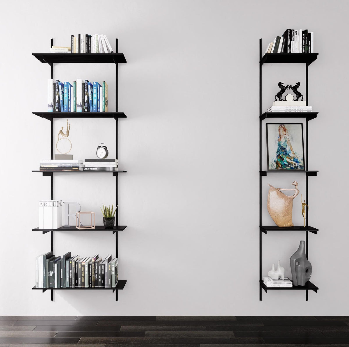 Modular shelving unit with black shelves, black vertical posts, and one bay, shown with three open shelf levels styled in a room setting.