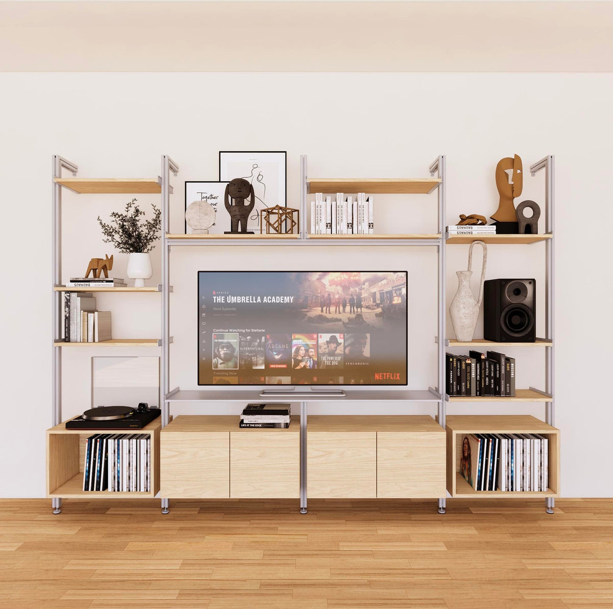 Harmony four-bay media unit with Casting Light shelves and satin vertical posts, four bays, shown with open shelf levels.
