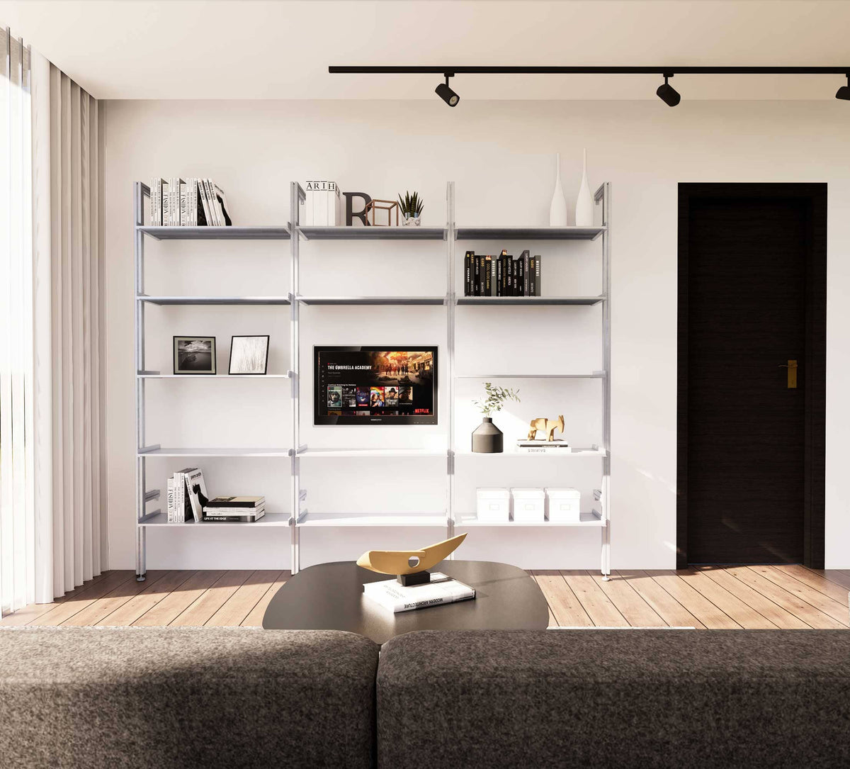 Modular media shelving unit with white shelves and white vertical posts, one bay, styled as an entertainment storage unit.