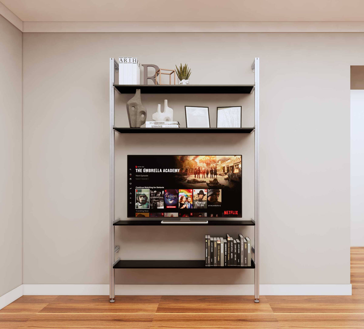 Modular media shelving unit with black shelves and satin vertical posts, one bay, shown with open shelf levels.