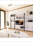 Modular media shelving unit with black shelves and white vertical posts, one bay, styled as an entertainment storage unit.