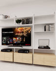 Modular media shelving unit, shown with open shelf levels.