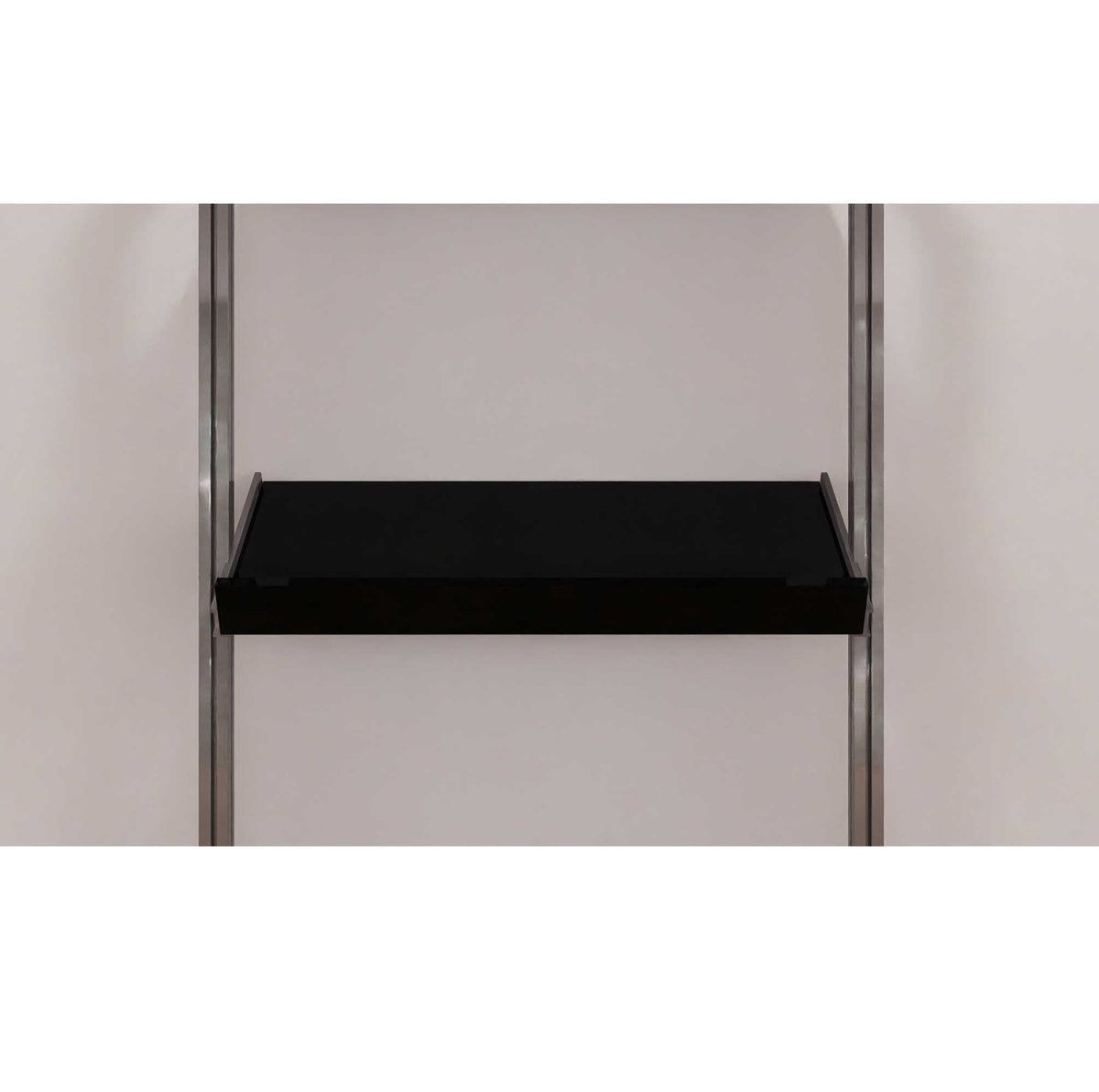 Modular shelving unit with white shelves and white vertical posts.