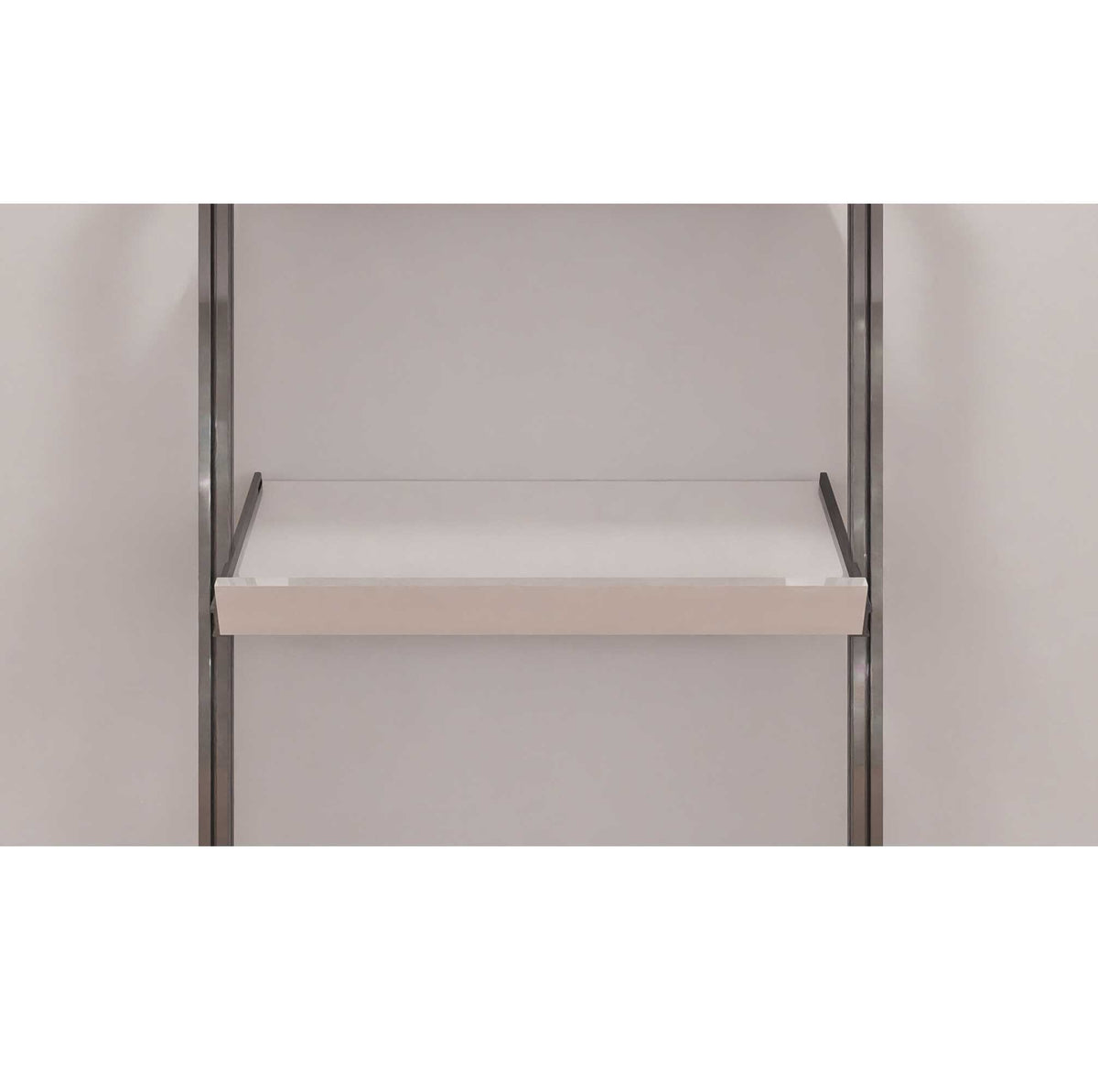 Modular shelving unit with white shelves and white vertical posts.
